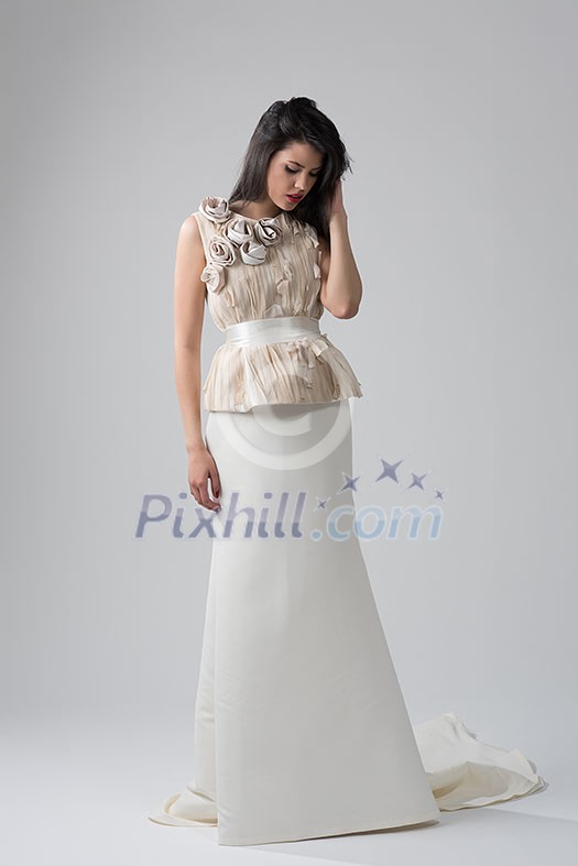 Portrait of beautiful young women in wedding dress isolated on a white background Portrait of beautiful young women in wedding dress isolated on a white background