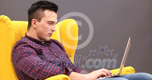 Young Entrepreneur Freelancer Working Using A Laptop And In Coworking space