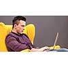 Young Entrepreneur Freelancer Working Using A Laptop And In Coworking space