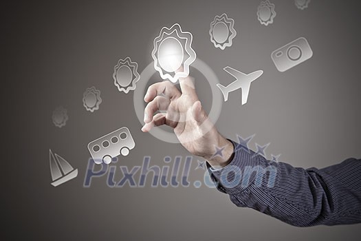 Hand of man pressing icon of media interface Hand of man pressing icon of media interface
