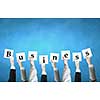Group of business people holding in hands cards with letters 