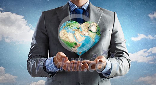 Businessman hands holding Earth planet. Elements of this image are furnished by NASA Businessman hands holding Earth planet. Elements of this image are furnished by NASA