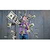 business, people and finances concept  Happy young businessman throwing US dollar banknotes and enjoying while making the rain of money in new startup office
