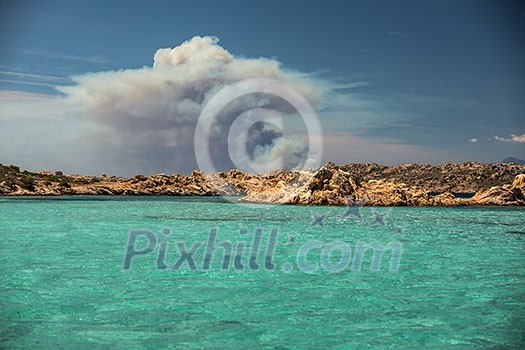 Scenic Sardinia island landscape with Corsica burning in distance - Sardinia sea ​​coast with azure clear water Scenic Sardinia island landscape with Corsica burning in distance - Sardinia sea ​​coast with azure clear water