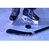 two hockey sticsk and puck on ice, start of the game, competition concept in business, top view