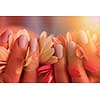 beauty delicate woman hands with manicure holding flower close up