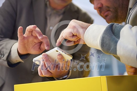 close up photo of business man work on phone at office close up photo of business man work on phone at office