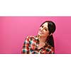 Beautiful face of young adult woman with clean fresh skin - studio portrait