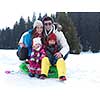 Winter playing, fun, snow and family portrait  sledding at winter time