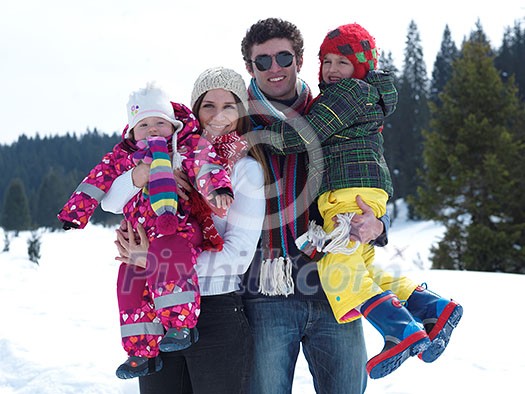 Winter playing, fun, snow and family portrait  sledding at winter time