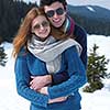romantic winter  scene, happy young couple having fun on fresh show on winter vacatio, mountain nature landscape