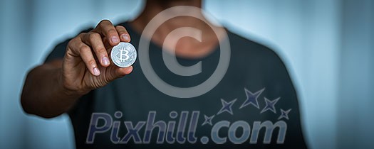 Bitcoin - Cryptocurrency concept - cryptocurrency being held as a value conserving asset as well a mean of swift exchange having a fungible, antiinflationary, decentralized nature Bitcoin - Cryptocurrency concept - cryptocurrency being held as a value conserving asset as well a mean of swift exchange having a fungible, antiinflationary, decentralized nature