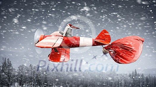 Man in suit and Santa hat flying on airplane. Mixed media