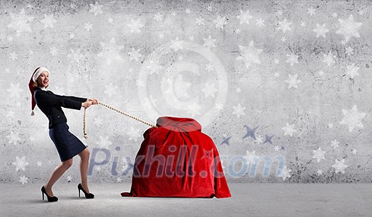 Santa woman pulling huge red gifts bag Santa woman pulling huge red gifts bag