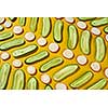 Fresh ripe radish, cucumber - ingredients for cookind dieting vegetarian food on a yellow background. Vegan food ceometric background. Top view.