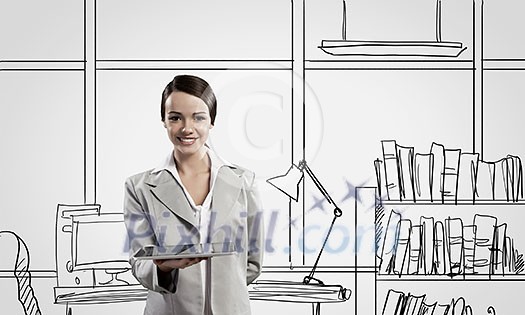 Young confident businesswoman standing in drawn office Young confident businesswoman standing in drawn office