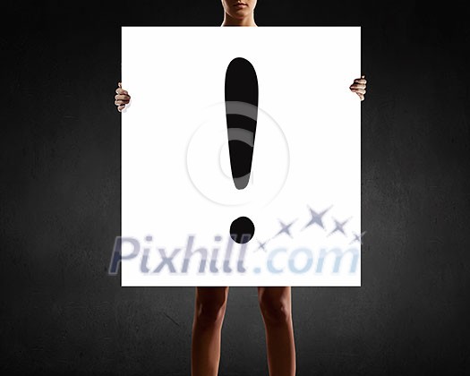 Young woman showing white banner with exclamation mark Young woman showing white banner with exclamation mark