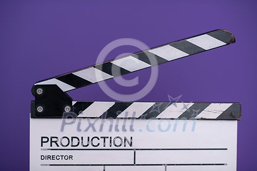 video production movie clapper cinema action and cut concept isolated on purple violet background video production movie clapper cinema action and cut concept isolated on purple violet background