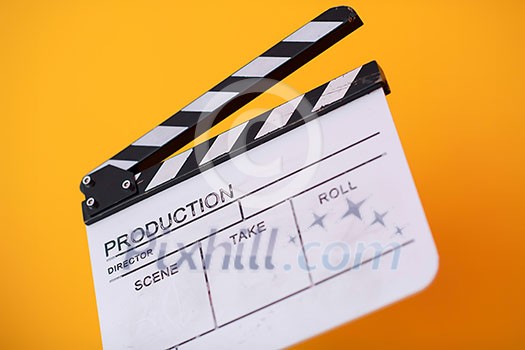 video production movie clapper cinema action and cut concept isolated on yellow background video production movie clapper cinema action and cut concept isolated on yellow background