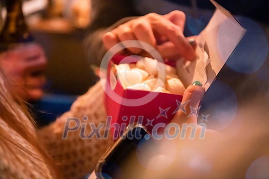 new year and christmas office party close up details food preparing and eating drinks and gifts authentic local startup business team new year and christmas office party close up details food preparing and eating drinks and gifts authentic local startup business team