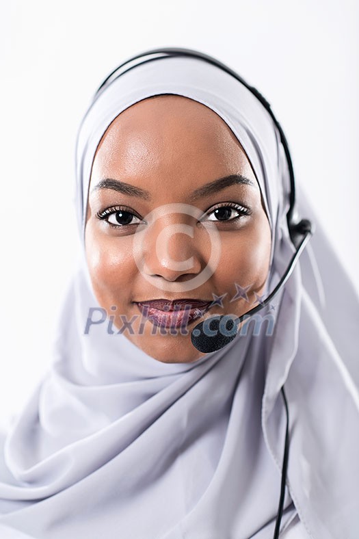 African muslim female with hijab scarf customer representative business woman with phone headset helping and supporting online with customer in modern bright call centre isolated on white background African muslim female with hijab scarf customer representative business woman with phone headset helping and supporting online with customer in modern bright call centre isolated on white background