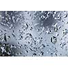 Water Drops On Window. Texture of glass with drops of water on a winter day. texture of macro water drops