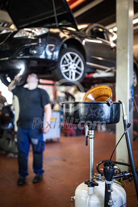Tyre change - wheel balancing or repair and change car tire at auto service garage or workshop by mechanic Tyre change - wheel balancing or repair and change car tire at auto service garage or workshop by mechanic