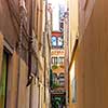 Venice Italian Destination. Narrow Venetian Pathway. Quaint street in historic Venice.