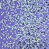 New Year decoration from bright small stars confetti on a lilac background. Holiday creative layout. Top view.