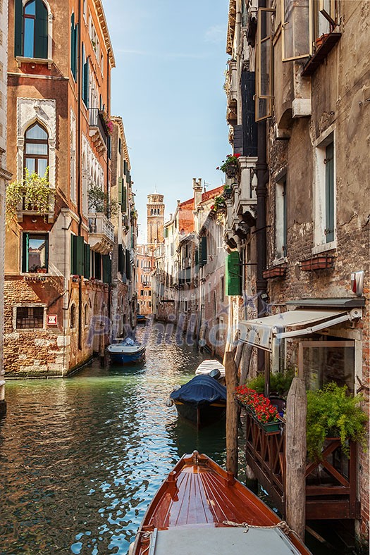 Venice, Italy, Grand Canal and historic tenements. Beautiful view of Grand Canal and old medival buildings.