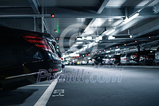 Underground garage or modern car parking with lots of vehicles Underground garage or modern car parking with lots of vehicles