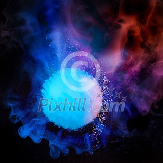 Abstract explosion of smoke colorful ball in blue, red and violet colours on a dark background with copy space. Abstract explosion of smoke colorful ball in blue, red and violet colours on a dark background with copy space.