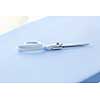 Close up of scissors lying on table