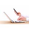 Close up of man's hands using laptop and splashes out of monitor