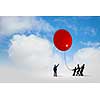 Little silhouettes of people pulling rope with balloon