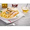 Breakfast of pancakes with cottage cheese and raisins. Tasty dessert. Crepes.