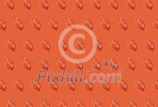 Decorative autumn backdrop with natural orange leaves on the same color background. Flat lay. Decorative autumn backdrop with natural orange leaves on the same color background. Flat lay.