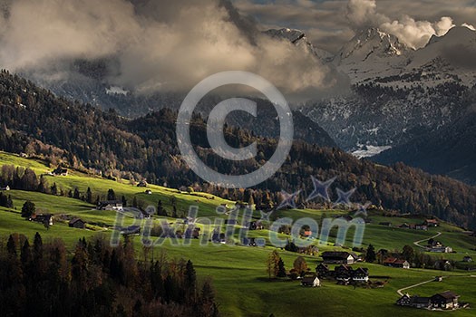 Splendid Swiss Appenzel countryside landscape with lovely warm light Splendid Swiss Appenzel countryside landscape with lovely warm light