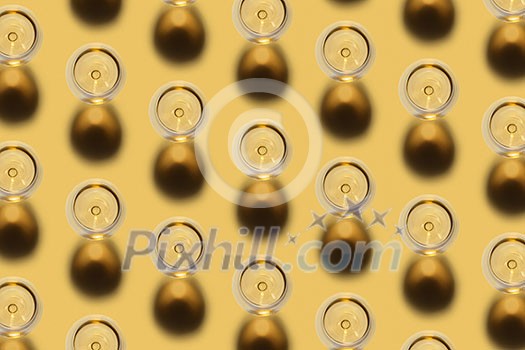 Diagonal pattern from glasses with white dry alcohol wine on a pastel yellow background with dark shadows. Top view. Diagonal pattern from glasses with white dry alcohol wine on a pastel yellow background with dark shadows. Top view.