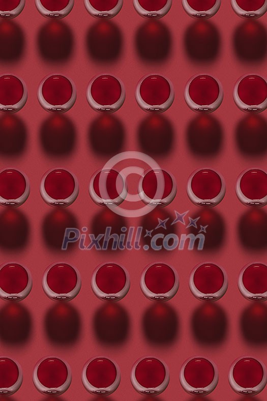 Geometric pattern from glasses with red wine alcoholic drink on a red background with hard shadows. Top view. Geometric pattern from glasses with red wine alcoholic drink on a red background with hard shadows. Top view.