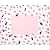 Blossoming floral photo frame from small flowers with green leaves with light pink rectangular paper area, copy space. Flat lay. Valentine's Day concept.