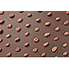 Natural fresh cacao beans on a brown background with soft shadows. Flat lay.