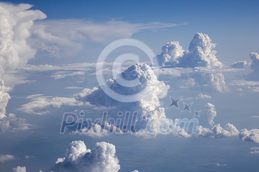 Bright clear blue sky covered white fluffy cumulus clouds in a summer sunny day with copy space. Travel and tourism concept. Bright clear blue sky covered white fluffy cumulus clouds in a summer sunny day with copy space. Travel and tourism concept.