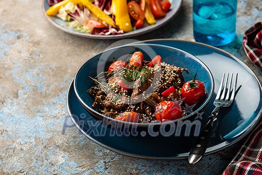 Soba noodles with beef, mushrooms, cherry tomato and sweet peppers. Soba noodles with beef, mushrooms, cherry tomato and sweet peppers.