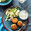 Chicken meat balls with zucchini salad and green peas, with garlic-yogurt sauce