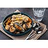 Risotto with seafood. Rice with shrimps and mussels. Mediterranean cuisine.