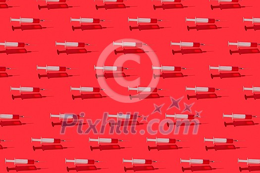 Horizontal medicinal pattern from floating surgical disposable syringes with red liquid or blood above red background with hard shadows and reflections. Horizontal medicinal pattern from floating surgical disposable syringes with red liquid or blood above red background with hard shadows and reflections.