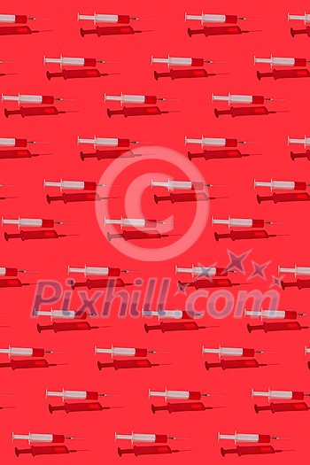 Medical vertical pattern from floating surgical disposable syringes with red liquid or blood above red background with hard shadows and reflections. Medical vertical pattern from floating surgical disposable syringes with red liquid or blood above red background with hard shadows and reflections.