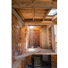 construction site interior of new two levels apartment with windows and red brick walls  construction site in progress to new house