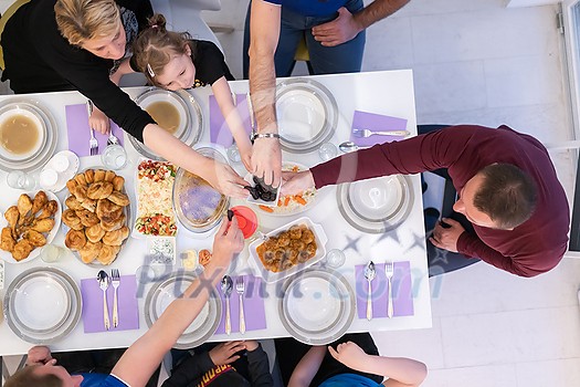 iftar dinner muslim family together during a ramadan feast at home top view iftar dinner muslim family together during a ramadan feast at home top view